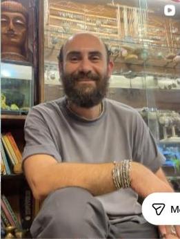 Ants owner surrounded by handmade jewellery and bracelets